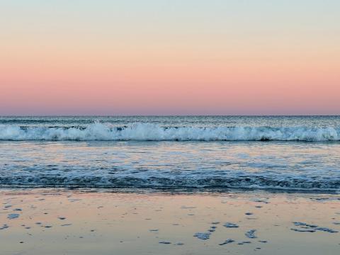 photo of the beach at sunset