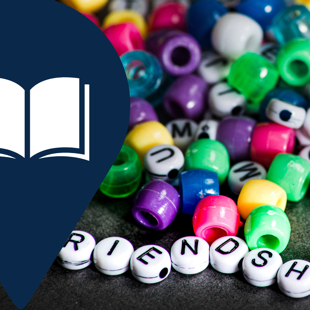 A picture of colorful beads on a table.